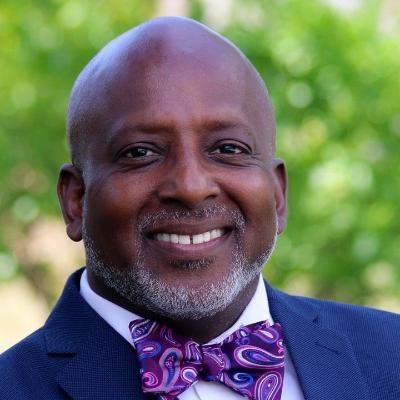 headshot of Family of Schools director Darin Earley